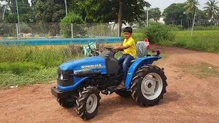 Small tractor with small boy😍