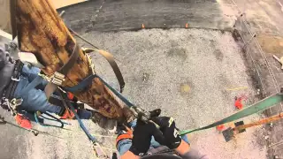 Climbing and working on a 45' power pole in first-person.