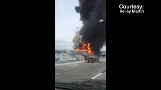 Driver passes raging fire on I-73