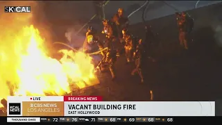 Crews battle apartment building fire in East Hollywood