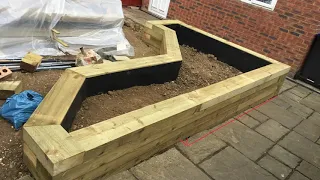 Build a raised planting bed in an angular design on sloped land