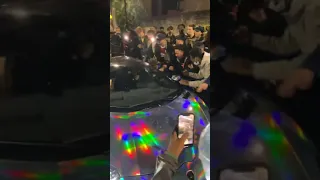 Pierre-Emerick Aubameyang's car was mobbed by Arsenal fans after a 3-1 derby victory over Tottenham