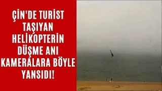 Çin'de turist taşıyan helikopterin düşme anı kameralara böyle yansıdı!