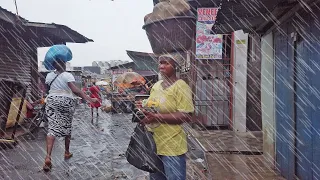 HEAVY RAIN FOR HOURS IN LOCAL GHANA MARKET MAKOLA, AFRICA