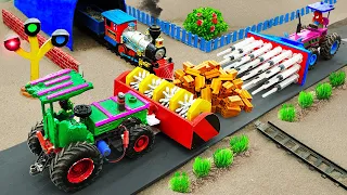 Diy tractor making bulldozer repair train railway | Rescues Train stuck in mini Bricks | HP Mini