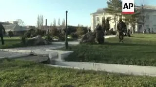 Pro-Russian forces storm Ukrainian airforce base, smash their way in with armoured vehicles