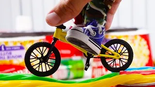 Riding finger BMX on candies | Candy Ride Challenge | BMX FINGER Soda can jump challenge Flick Trix