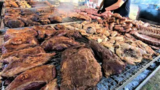 Italy Street Food. Grilling Huge Amount of Meat from Argentina  Asado, Angus, Ribs, Sausages