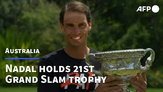 Nadal holds Aussie Open trophy after winning record 21st Slam | AFP