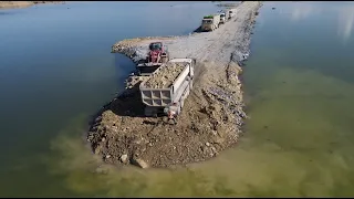 Great Mighty Wheel Loader Pushing Stone Building New Road Over Lake Driver Skills Dump Truck