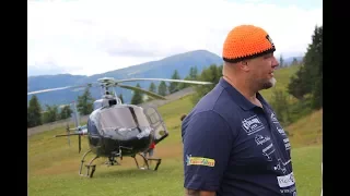 Strongman Smashes World Record by Lifting a Helicopter on Shoulders in Austria