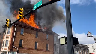 Watch as Fire Causes Roof to Collapse in an Apartment Building in Downtown Newark, Ohio