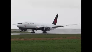 Wet Air Canada 777-300 landing, YVR.