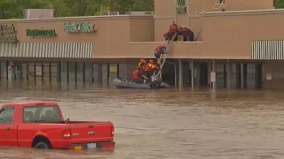 Firefighters Rescue People Trapped in Kansas City Floods