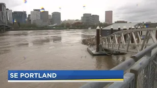 Willamette River flooding causing a mess of debris in Portland
