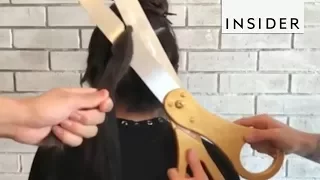 Stylist Uses Giant Scissors Cut Hair In One Slice