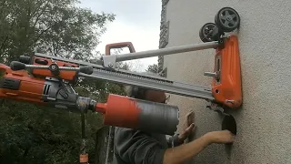 Core drilling a150mm hole through a 62cm solid stone wall.  Carotteuse.