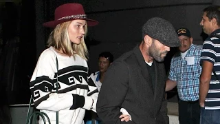 Rosie Huntington-Whiteley Clings To Boyfriend Jason Statham At LAX