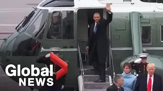Barack and Michelle Obama wave goodbye to Washington