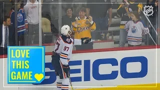 Connor McDavid gifts souvenir puck to a fan