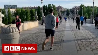 Coronavirus: Adults enjoy first outdoor exercise as Spain relaxes lockdown measures - BBC News