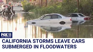 Cars submerged in Long Beach floodwaters after California storms