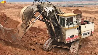 Increíble excavadora pesada más grande trabajando en el sitio de construcción