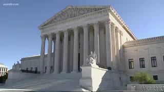 Demonstrators rally outside of U.S. Supreme Court ahead of abortion rights hearing