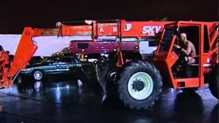 "Stone Cold" Steve Austin traps Triple H in his car and drops him with a forklift: Survivor Series