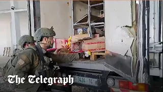 Israeli soldiers filmed setting fire to scarce water and food supplies