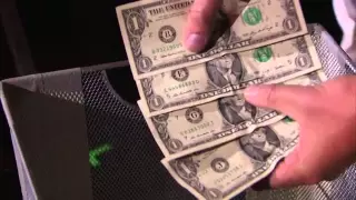 Mike Super  Magician Put Nick Cannon in a Money Machine   America's Got Talent 2014