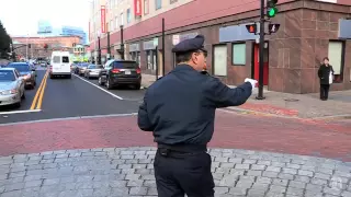 Dancing Cop, still traffic jamming at 64
