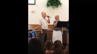 My papa singing in church