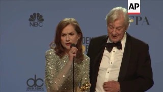 Isabelle Huppert reacts backstage to Golden Globe win for herself and for 'Elle'