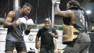 Mike Tyson helps out Francis Ngannou as he prepares for Tyson Fury