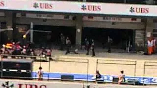 Button and Vettel pit-stop, shanghai, formula 1, 2011