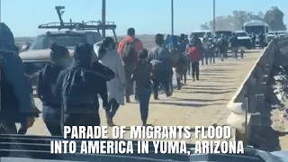 Migrants Stream Into America From Mexico In Yuma, Arizona