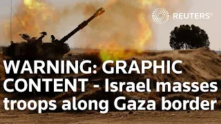 WARNING: GRAPHIC CONTENT - Israel masses troops along Gaza border as conflict escalates