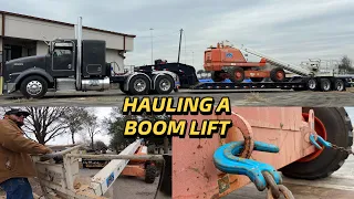 how to LOAD and SECURE telescopic boom lift to lowboy trailer / LOUD Kenworth with straight pipes