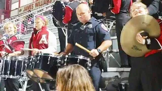 Arkansas Cop Shocks Crowd When He Drums With High School Football Band