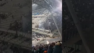 Marseille fans shoot fireworks at Paok fans