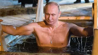 Russian President Putin takes icy dip on Epiphany