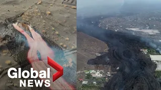 La Palma volcano: Drone video shows lava flowing from new vent, ash raining from crater