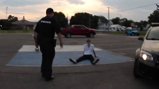 Skater tries to ollie a cop then gets arrested...