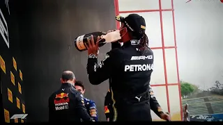 Lewis Hamilton Spits Out Champagne On The Podium