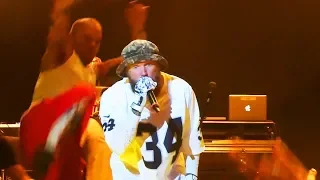 Shaggy 2 Dope pretends to drop kick Fred Durst of Limp Bizkit