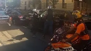 Two suspects in custody in NYC biker road rage incident