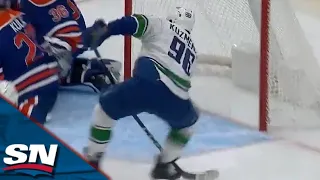 Andrei Kuzmenko Bangs Home First Career NHL Goal Off Beautiful Feed From J.T. Miller