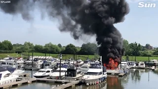 Three injured after boat explodes into flames in marina on hottest