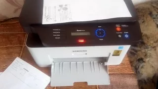 Hacking a printer for FREE! M2070